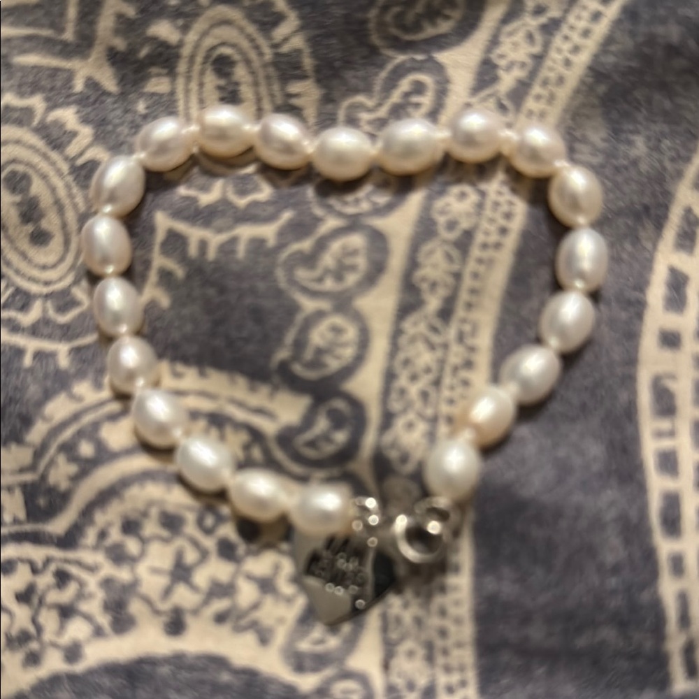 Elegant Pearl Bracelet with Heart Charm